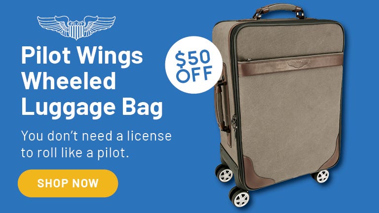 Plot Wings Wheeled Luggae Bag on blue background