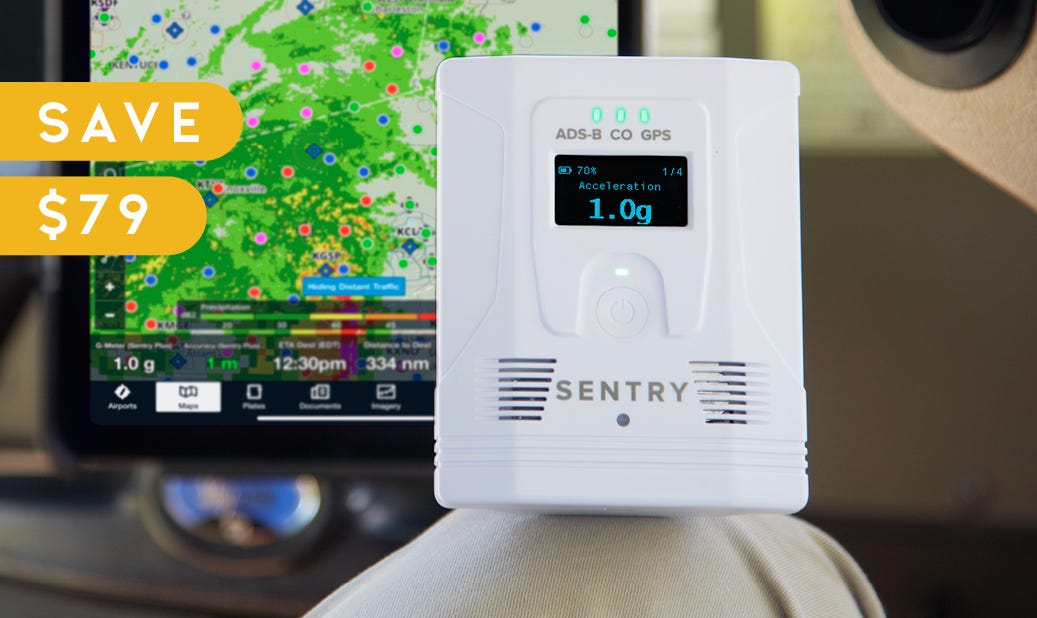 Sentry Plus sitting on pilots knee