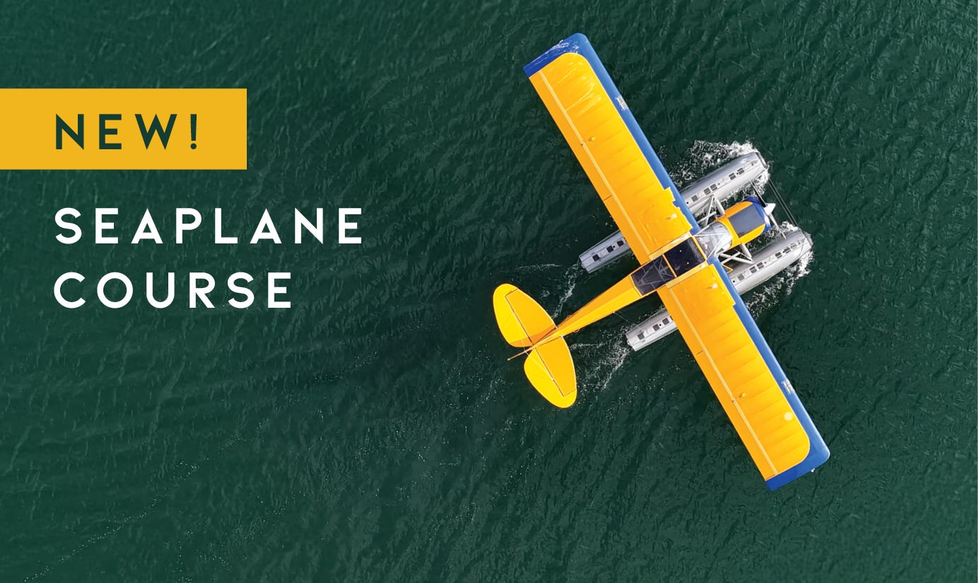 Overhead view of yellow Seaplane on green lake - New Course - Shop Now