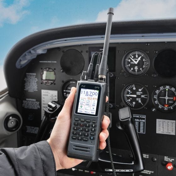 PJ2 GPS Radio in hand in cockpit