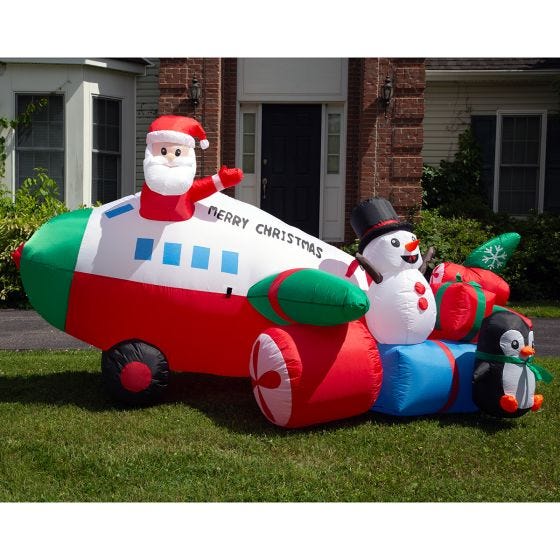 Santa and Friends Airplane Inflatable in front of the house Santa and Friends Airplane Inflatable in front of the house