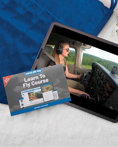 2024 learn to fly course displayed on tablet screen with gift decoration
