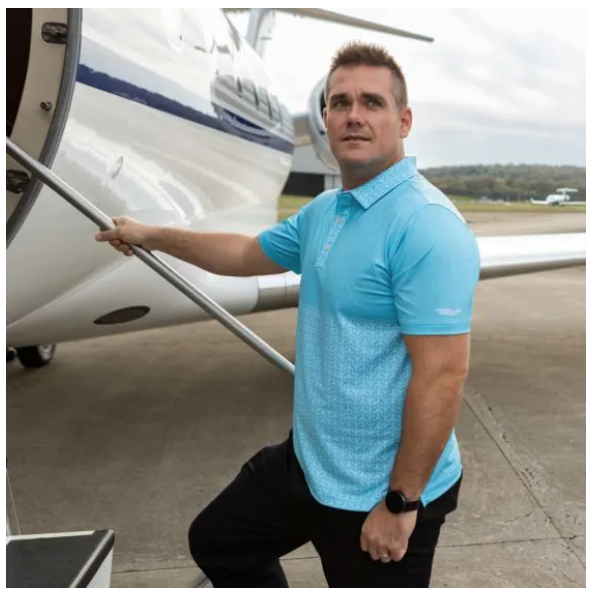 Branden Thompson steppin onto airplane
