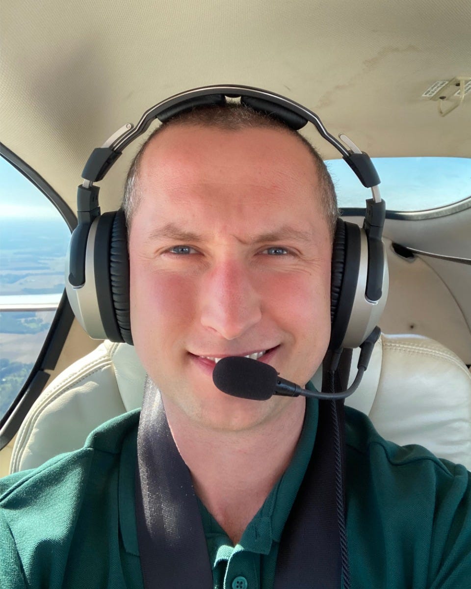 Chris McGonegle flying plane with Lightspeed headset