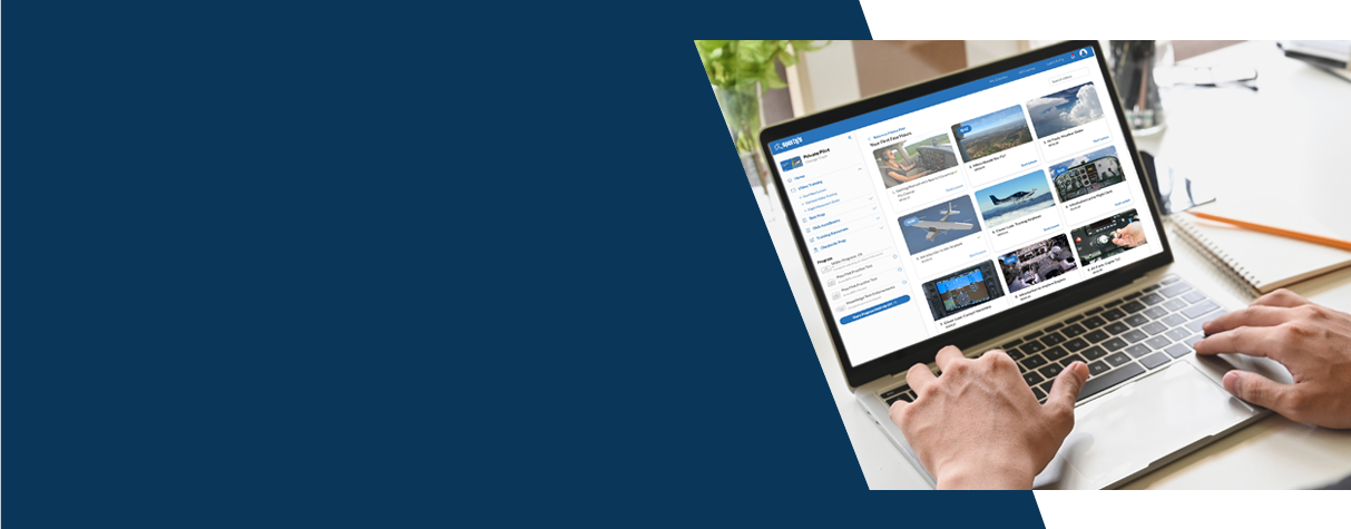 Someone on a laptop with online course menus showing