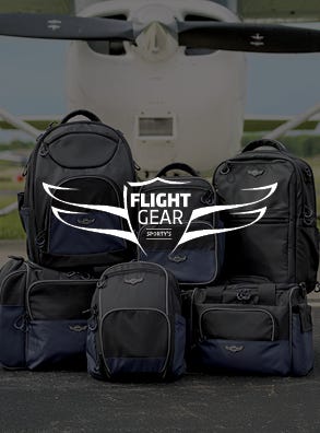 flight gear with flight gear bags displayed in background with logo on top