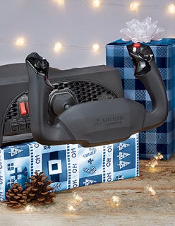 Desktop flight simulator setup with user flying plane