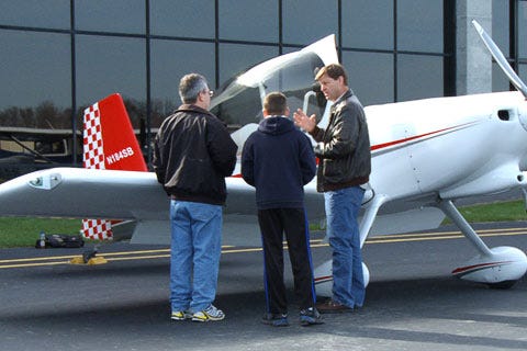 Parent and kid with instructor