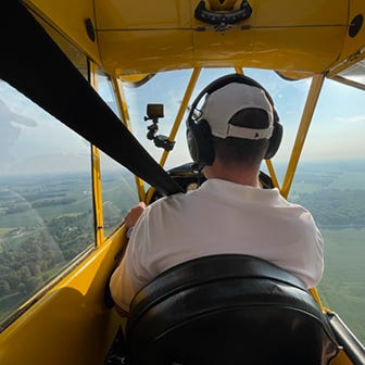 flight training central article - common atc radio mistakes, picture of pilot flying cub