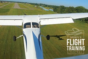 plane nearing runway to land