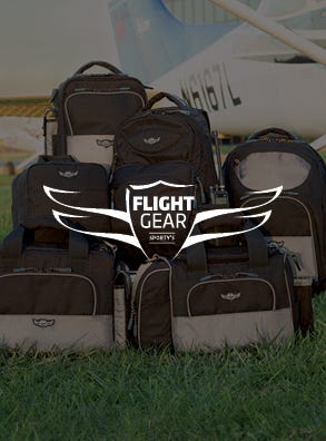 flight gear with flight gear bags displayed in background with logo on top