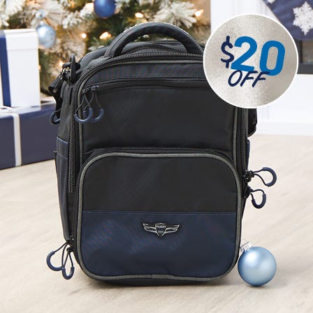 $20 off ipad bag, built for the modern pilot. blue and black ipad bag in front of christmas tree