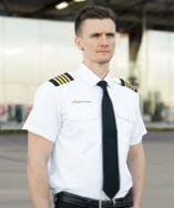 pilot in white airline work shirt