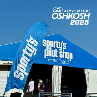 visit sporty's at oshkosh. can't miss deals and new products. picture of sporty's tent at oshkosh