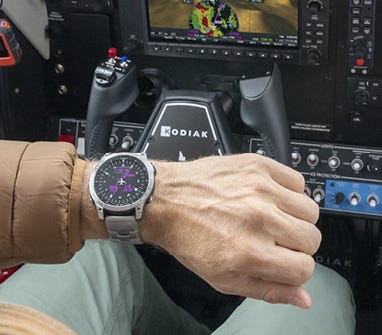 Pilot wearing an aviation watch