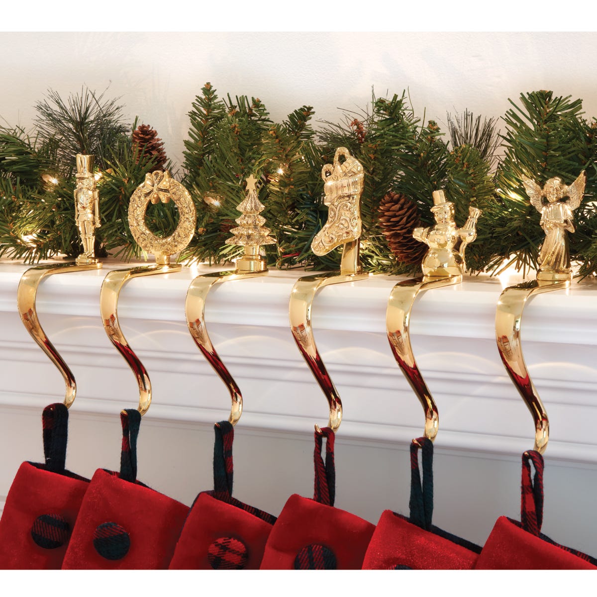 Hang your stockings with care using these solid brass holders. All are exclusive designs and highly polished to a brilliant luster. Hooks stay in place with the weight of the stocking. Unique offset design is perfect for mantels or shelves.
