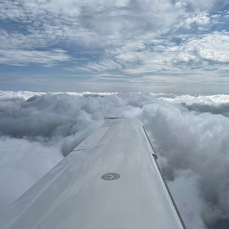 The 12-Second Rule. Estimate VFR cloud gaps in seconds. Picture of an aircraft wing above clouds.